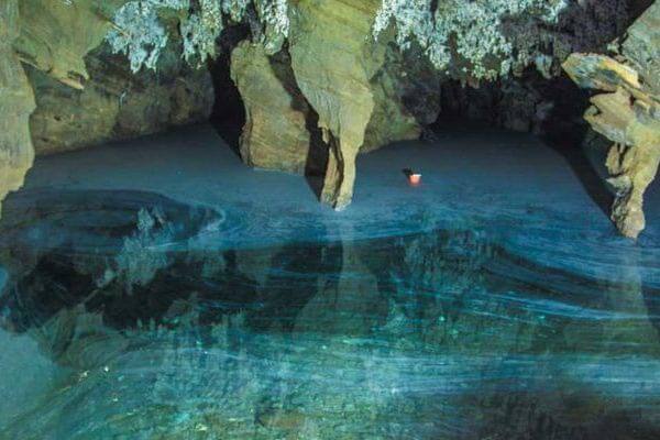 Do 10 push-ups in the Sterkfontein Caves