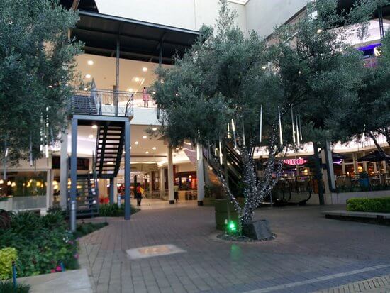 Make a snow angel on the ice rink at The Grove Mall